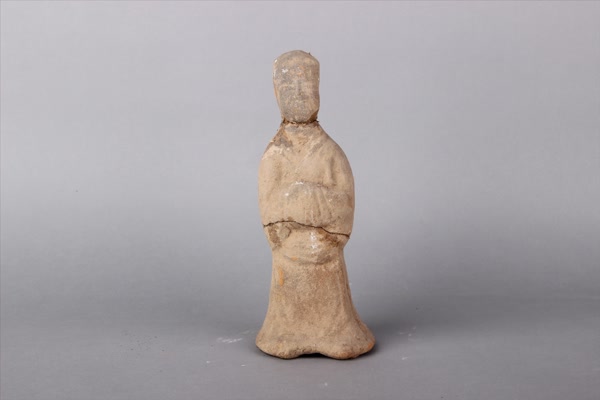 东汉红陶佩剑侍俑